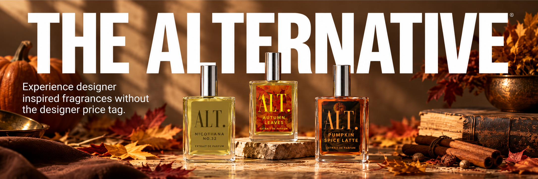 Three Altarum fragrance bottles displayed on a rustic wooden surface with autumn leaves, cinnamon sticks, and books in the background. Large white text at the top reads 'THE ALTERNATIVE'.